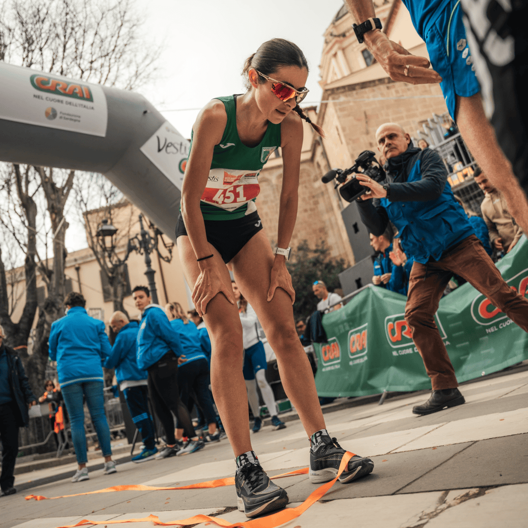 tired woman after running a half marathon